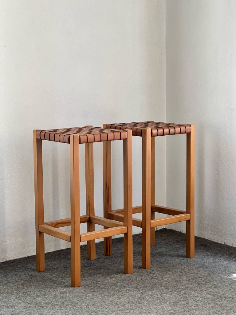 Pair of high stools in wood and woven leather