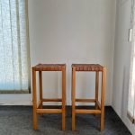 Pair of high stools in wood and woven leather